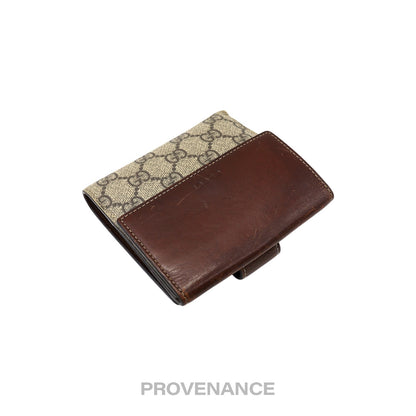 🔴 Gucci Trifold Snap Wallet - GG Supreme Brown