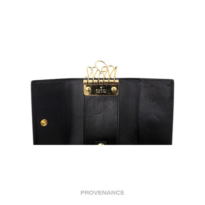 🔴 Gucci GG Vintage Logo 6 Key Holder - Black Leather Gold