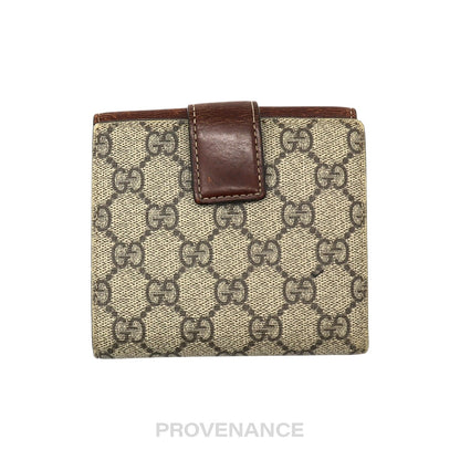🔴 Gucci Trifold Snap Wallet - GG Supreme Brown