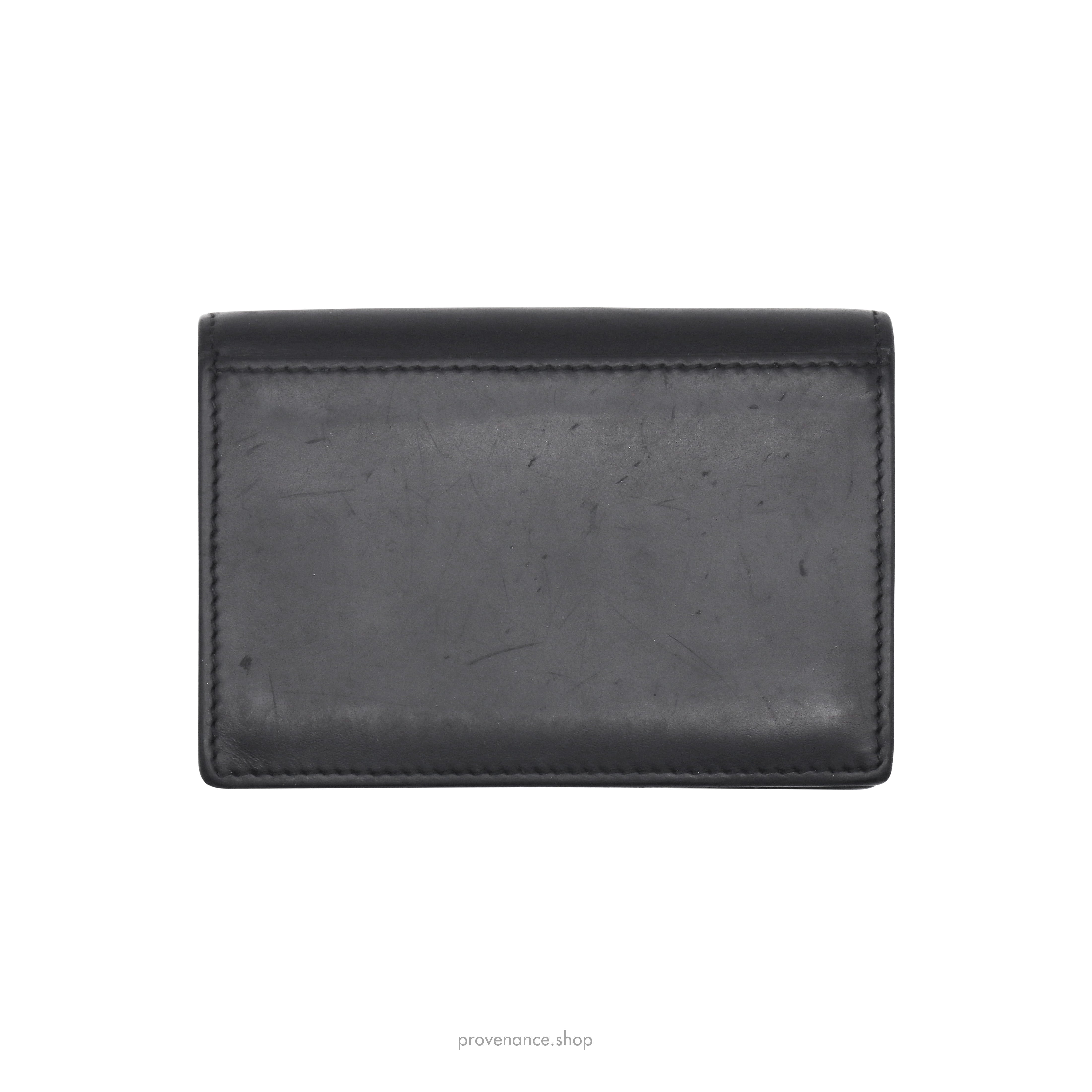 Givenchy Wallet Star Embossed Leather Black in Calfskin Leather - US